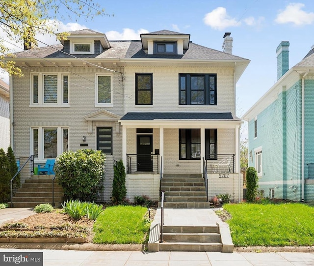 5707 Colorado Ave NW, Washington, DC 20011 - traditional style home featuring brick siding and covered porch