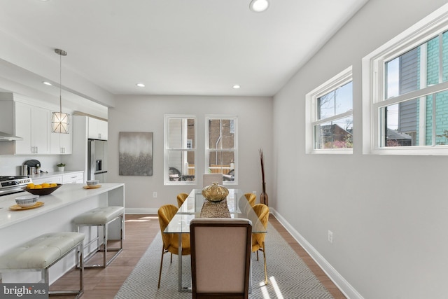 5707 Colorado Ave NW, Washington, DC 20011 - dining room featuring recessed lighting, wood finished floors, and baseboards
