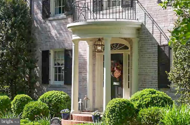 4817 Rodman St NW, Washington, DC 20016 - entrance to property with a balcony and brick siding