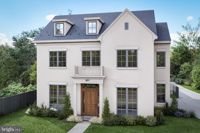 view of front of house featuring fence, a high end roof, stucco siding, and a front lawn