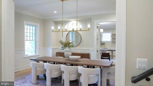 4817 Rodman St NW, Washington, DC 20016 - dining space featuring wainscoting, plenty of natural light, a chandelier, recessed lighting, and ornamental molding