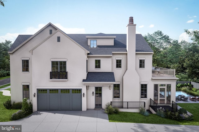 view of front of house featuring a balcony, stucco siding, a chimney, an attached garage, and driveway