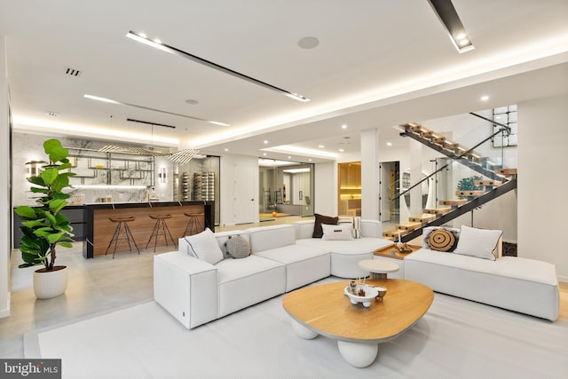 building lobby featuring stairway and visible vents