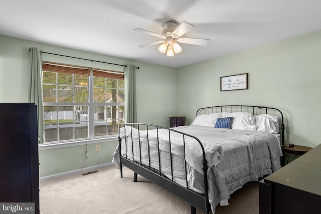 6011 Bauman Dr, Elkridge, MD 21075 - bedroom featuring baseboards, a ceiling fan, visible vents, and carpet