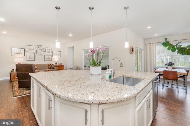 kitchen with recessed lighting, dark wood-style flooring, white cabinetry, and a sink