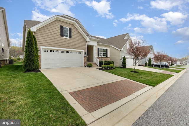 view of front facade with central AC, a front lawn, and decorative driveway