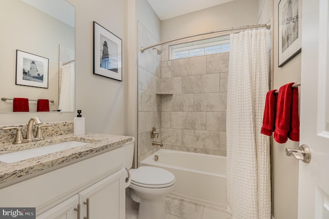 full bath with toilet, shower / bath combo with shower curtain, tile patterned flooring, and vanity