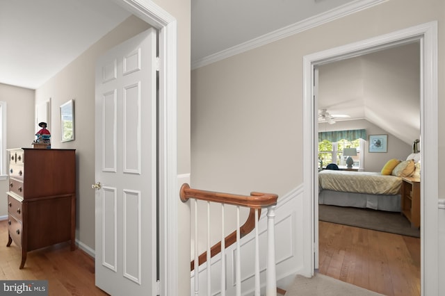 11836 Hunting Ridge Ct, Potomac, MD 20854 - hallway with wood finished floors, ornamental molding, and lofted ceiling