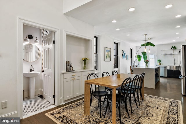 dining space featuring recessed lighting and dark wood-style floors