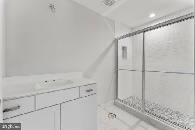 17 Hickory Ln, Malvern, PA 19355 - bathroom featuring vanity, visible vents, marble finish floor, a stall shower, and baseboards