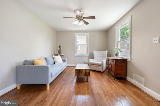 3809 13th St S, Arlington, VA 22204 - living room featuring visible vents, a ceiling fan, baseboards, and wood finished floors
