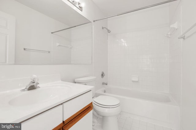full bathroom featuring vanity, tile patterned flooring, bathing tub / shower combination, and toilet