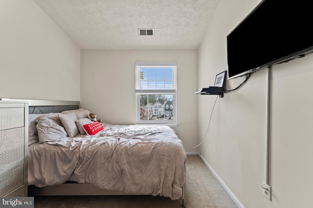 10633 Campus Way S, Upper Marlboro, MD 20774 - carpeted bedroom featuring baseboards, visible vents, and a textured ceiling