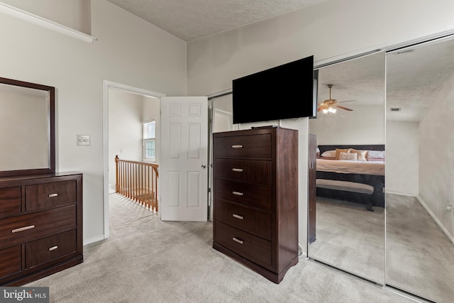 10633 Campus Way S, Upper Marlboro, MD 20774 - bedroom with light carpet, a textured ceiling, and baseboards