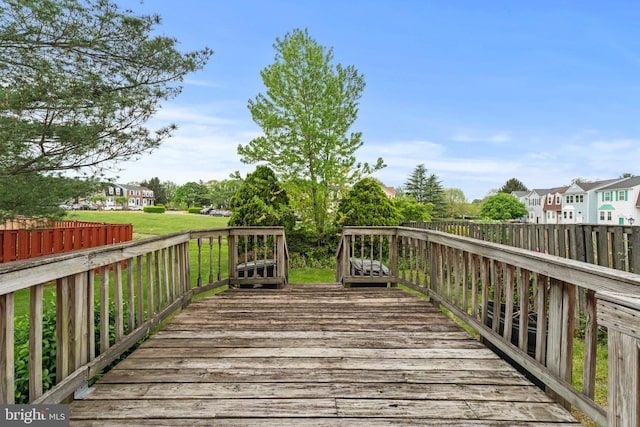 10633 Campus Way S, Upper Marlboro, MD 20774 - wooden terrace featuring a lawn and a residential view