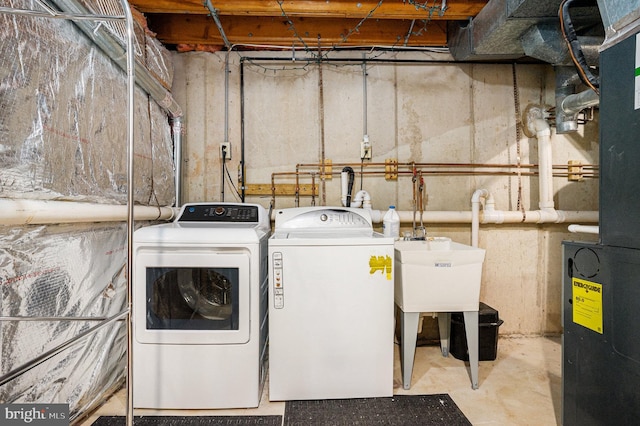 laundry room featuring washing machine and dryer