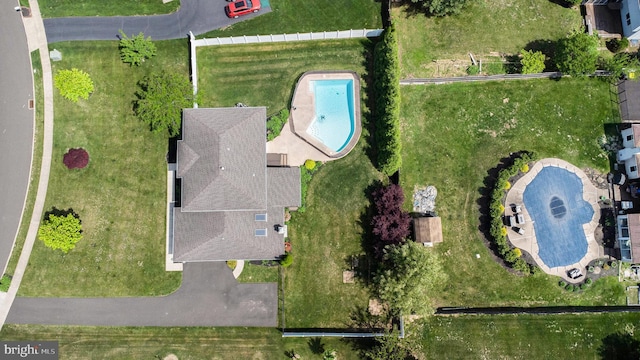 view of property location featuring a pool area