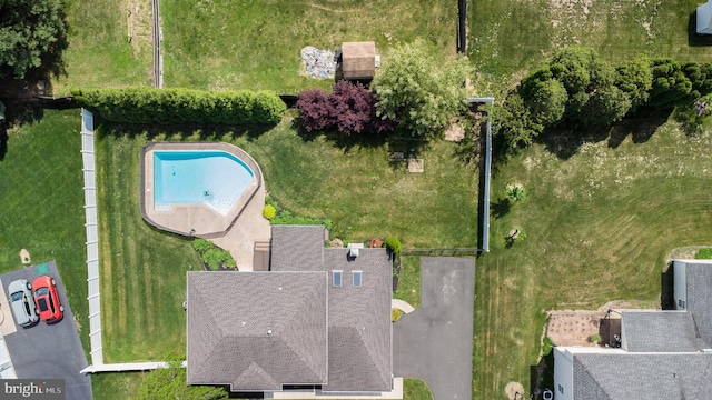 aerial view of property's location with a pool