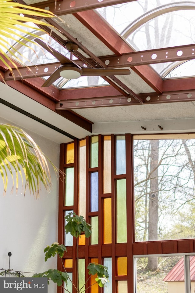 interior space featuring ceiling fan