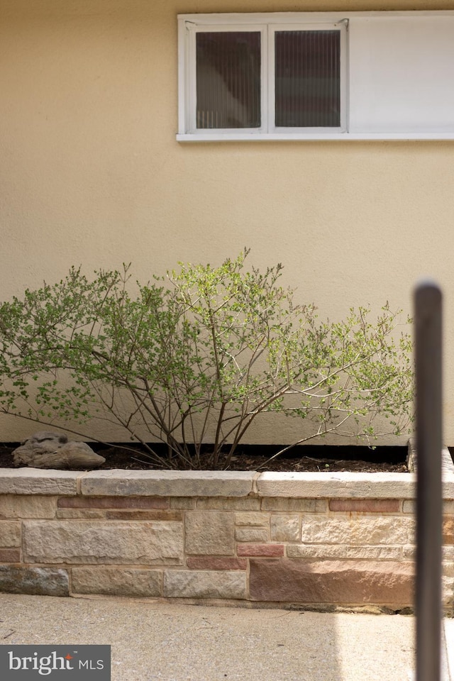 details featuring stucco siding