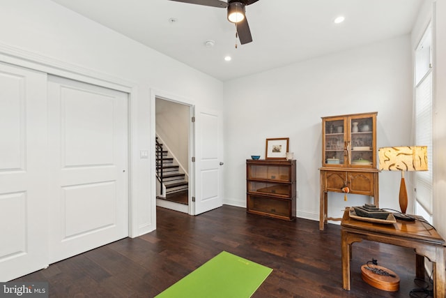 workout room featuring baseboards, wood finished floors, recessed lighting, and ceiling fan