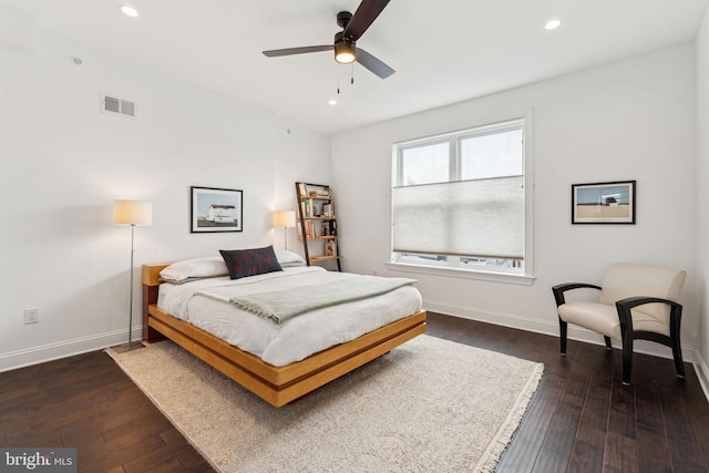 bedroom featuring recessed lighting, dark wood-type flooring, visible vents, and baseboards