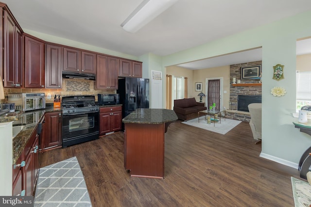 420 Concetta Dr, Mount Royal, NJ 08061 - kitchen featuring black appliances, under cabinet range hood, reddish brown cabinets, and open floor plan