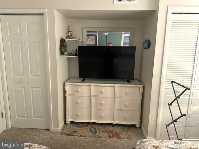 504 E 17th Ave Unit 206, Wildwood, NJ 08260 - bedroom with dark carpet, baseboards, and visible vents