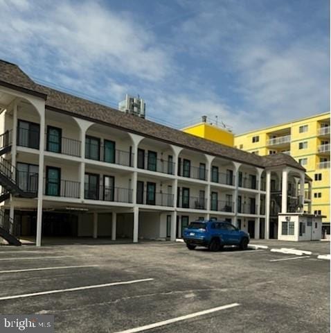 504 E 17th Ave Unit 206, Wildwood, NJ 08260 - view of building exterior with uncovered parking