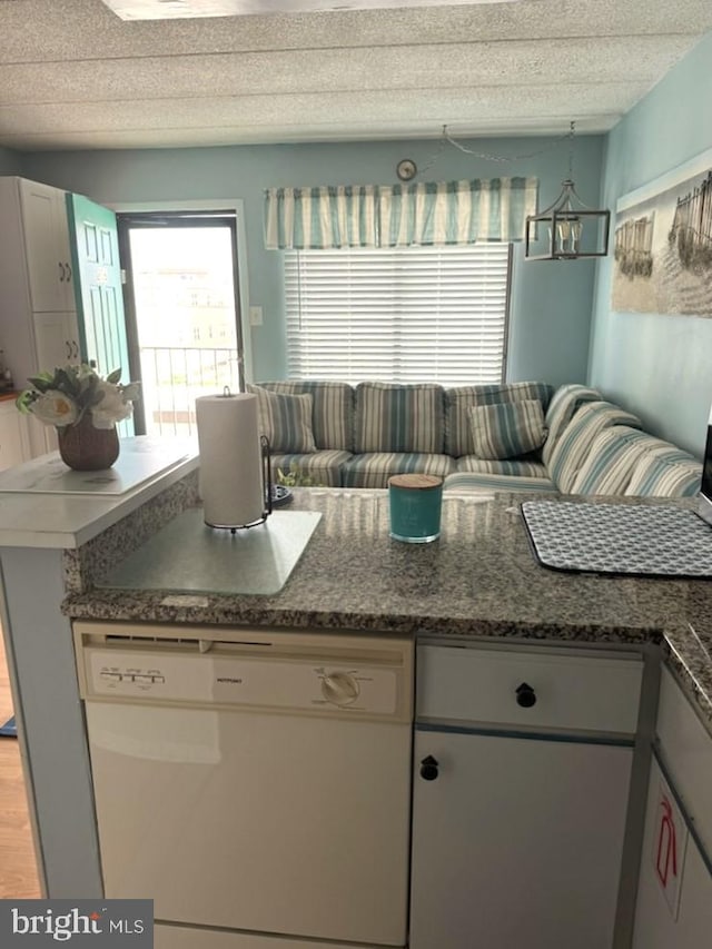 504 E 17th Ave Unit 206, Wildwood, NJ 08260 - kitchen featuring a notable chandelier and white dishwasher