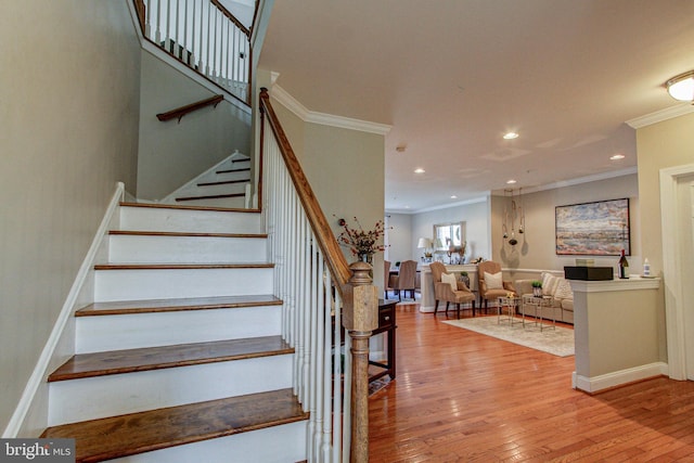 33 Brownstone Dr, East Norriton, PA 19401 - staircase with wood-type flooring, baseboards, ornamental molding, and recessed lighting