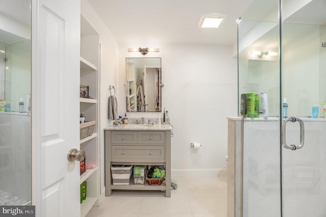 33 Brownstone Dr, East Norriton, PA 19401 - bathroom with baseboards, vanity, tile patterned floors, and a stall shower