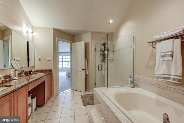 33 Brownstone Dr, East Norriton, PA 19401 - bathroom with tile patterned flooring, double vanity, a sink, a garden tub, and a stall shower