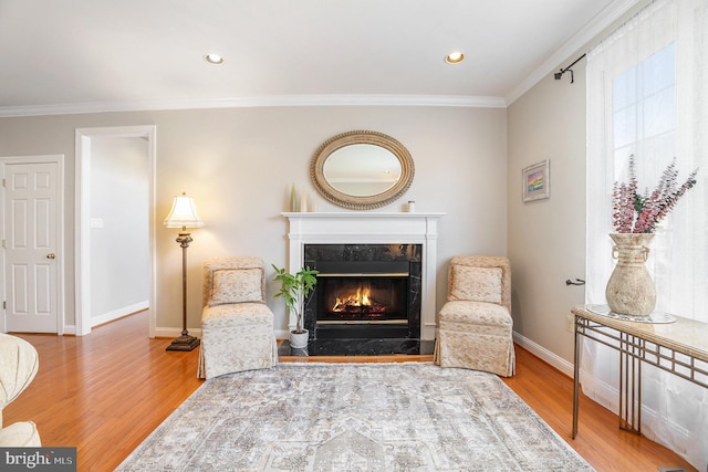 33 Brownstone Dr, East Norriton, PA 19401 - sitting room with baseboards, recessed lighting, wood finished floors, a fireplace, and ornamental molding