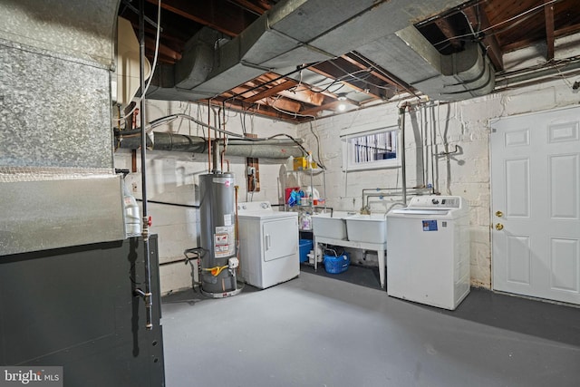 basement with washing machine and dryer and gas water heater