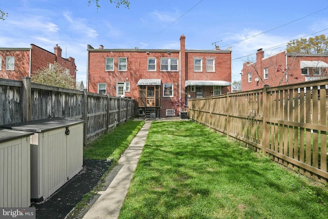 view of yard featuring a fenced backyard