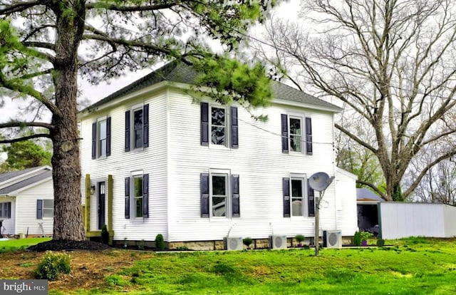 10155 Atlantic Rd, Atlantic, VA 23303 - view of front of house with ac unit, roof with shingles, and a front yard
