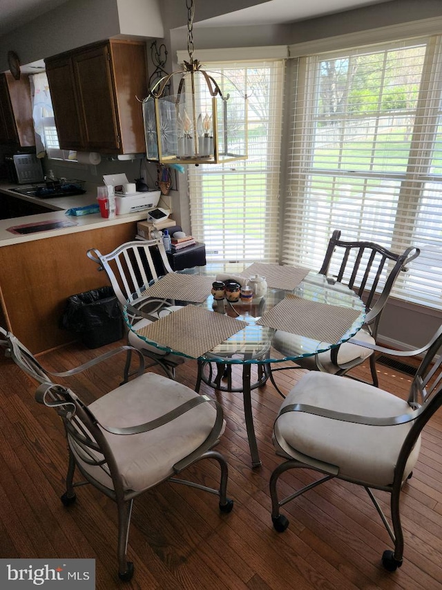 dining area featuring wood finished floors