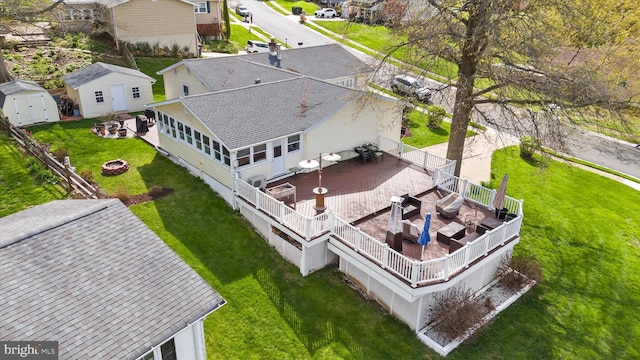 birds eye view of property with a residential view