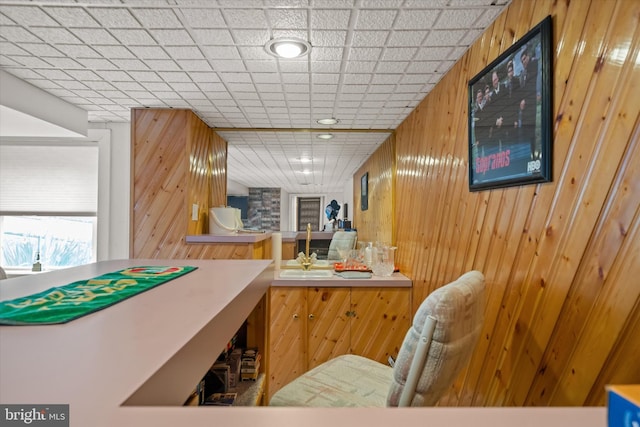 interior space featuring wood walls