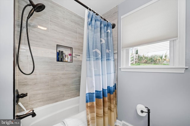 full bath featuring shower / bath combo with shower curtain