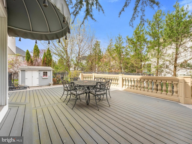 28 Vanessa Ct, Cherry Hill, NJ 08003 - wooden deck featuring a shed and outdoor dining area