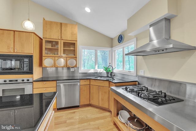2010 Welsh Vly, Malvern, PA 19355 - kitchen with wall chimney range hood, black appliances, light wood finished floors, a sink, and lofted ceiling