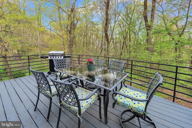 2010 Welsh Vly, Malvern, PA 19355 - wooden terrace with outdoor dining area, grilling area, and a view of trees