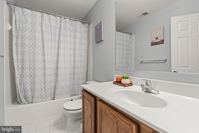 full bath featuring toilet, tile patterned floors, vanity, and shower / bath combination with curtain