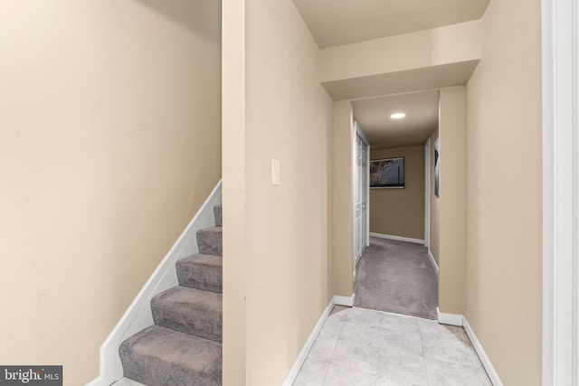 stairway with baseboards