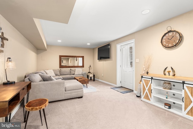 living area with carpet, recessed lighting, and baseboards
