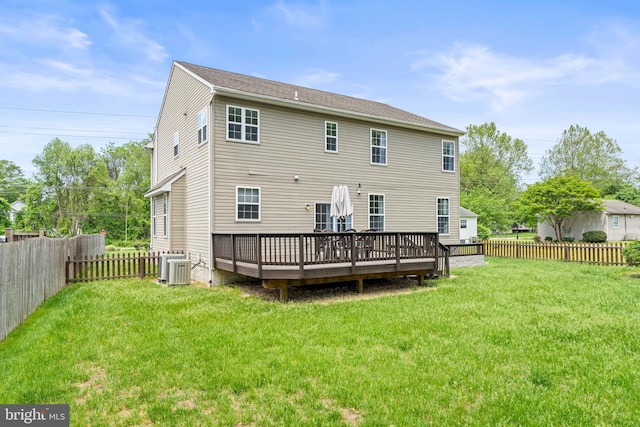 back of property with a wooden deck and central air condition unit