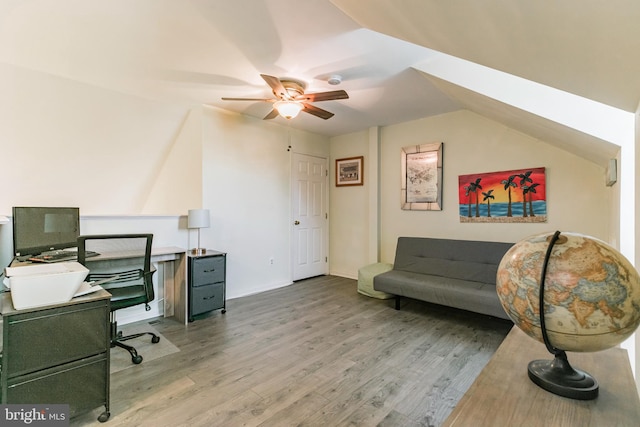 home office featuring a ceiling fan and light wood-type flooring