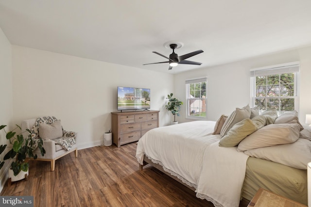 12527 Misty Water Dr, Herndon, VA 20170 - bedroom featuring baseboards, wood finished floors, and ceiling fan